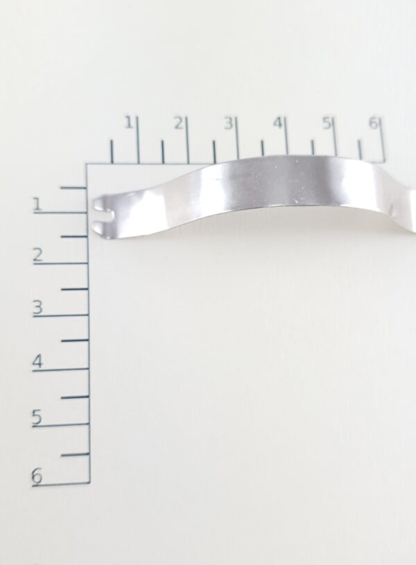 Sprężynka dociskowa do ram aluminiowych – akcesoria montażowe do ramek